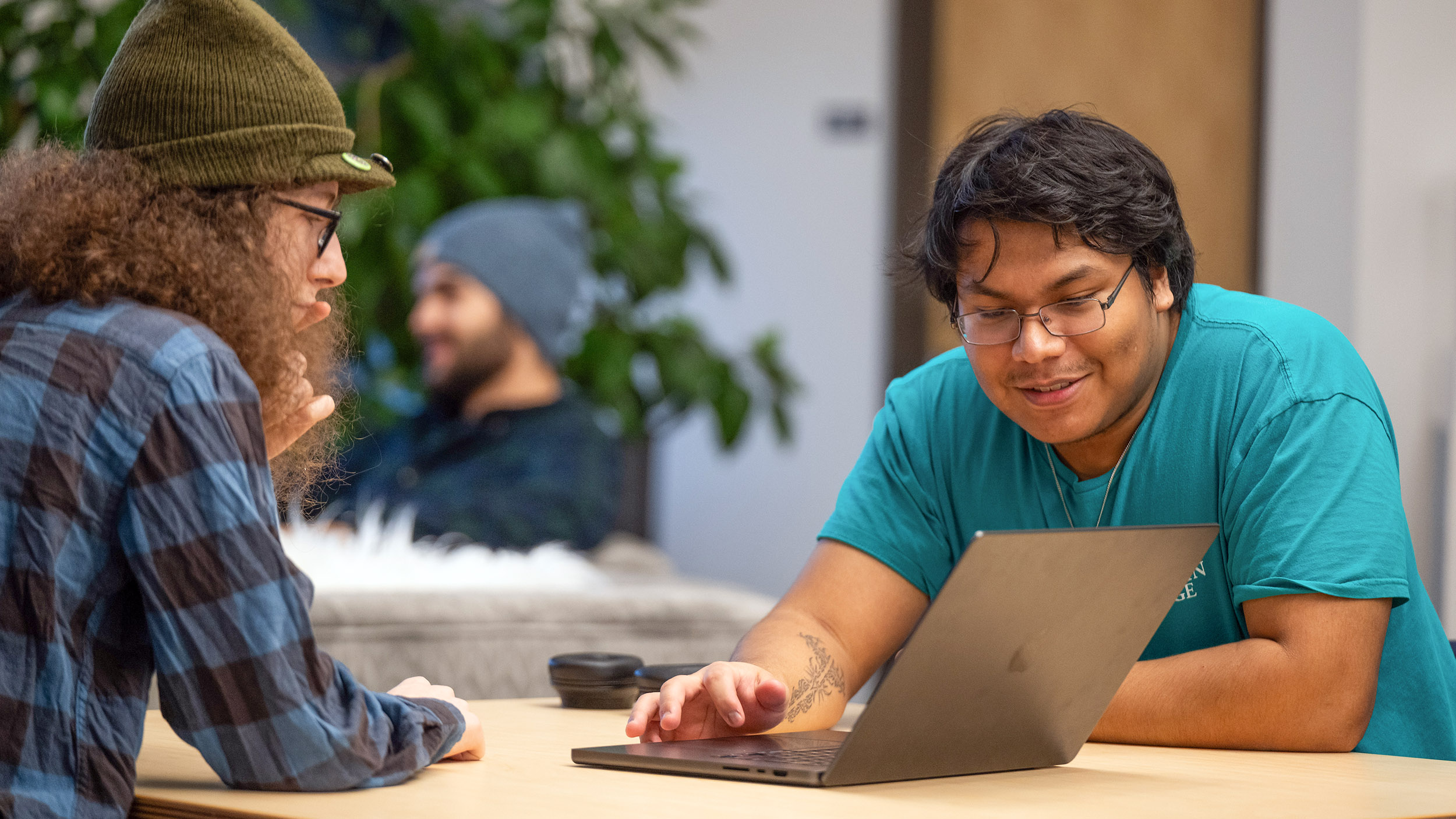 students looking at a laptop