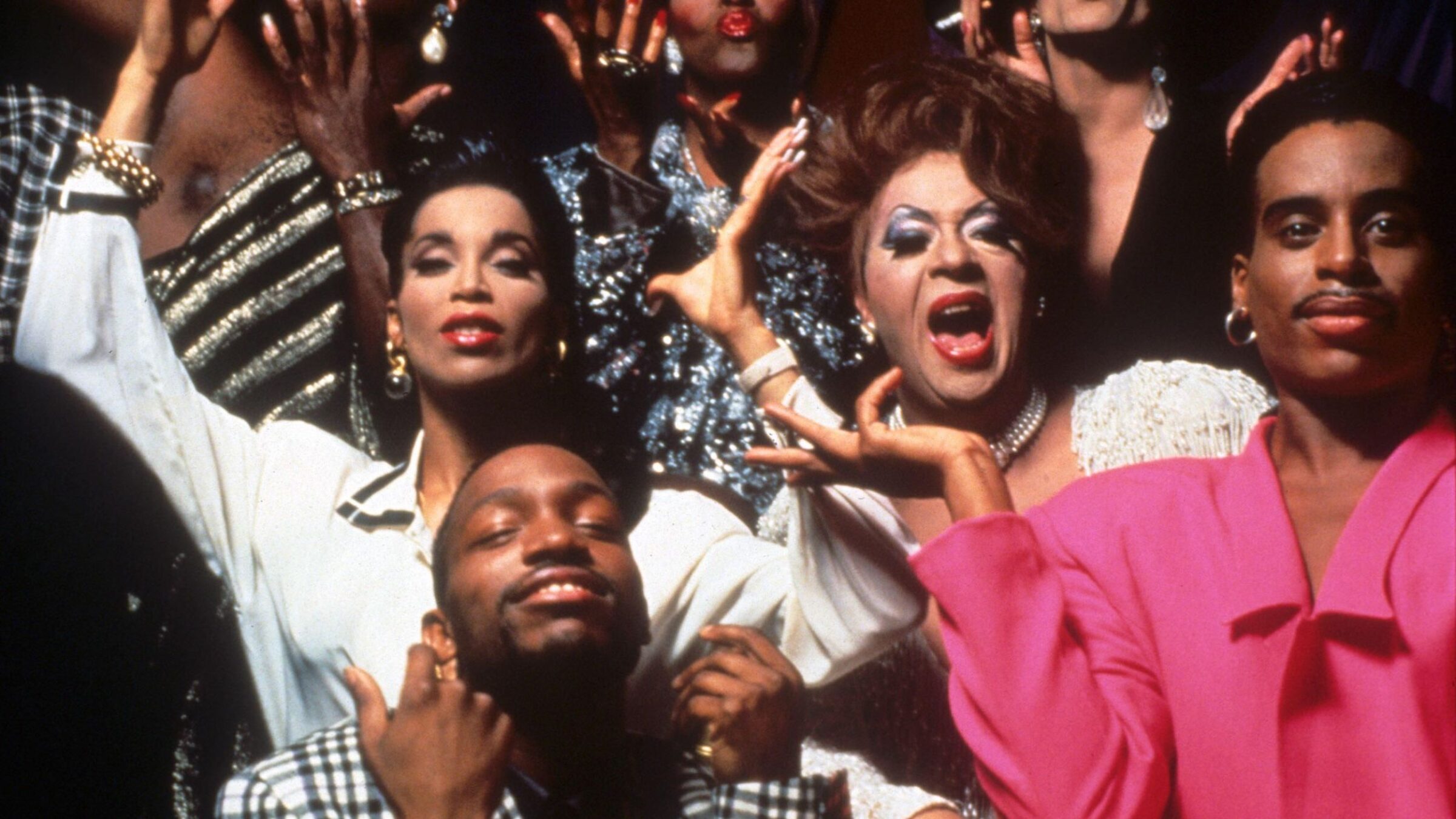 four people cheering