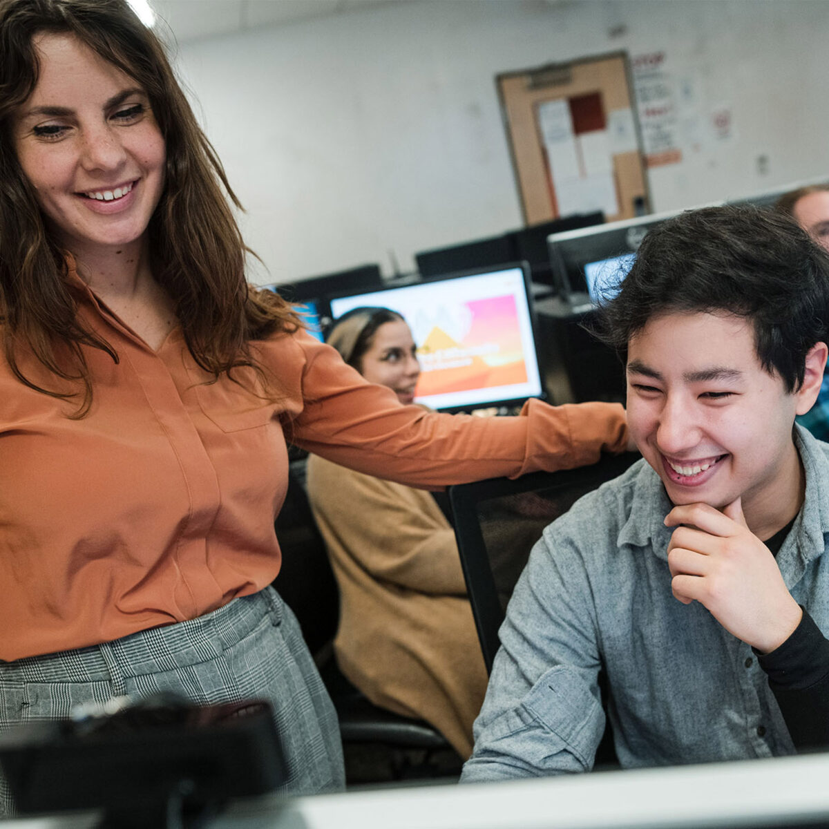 abstract image with colorful lighted elements and "AI" boldly written in the center