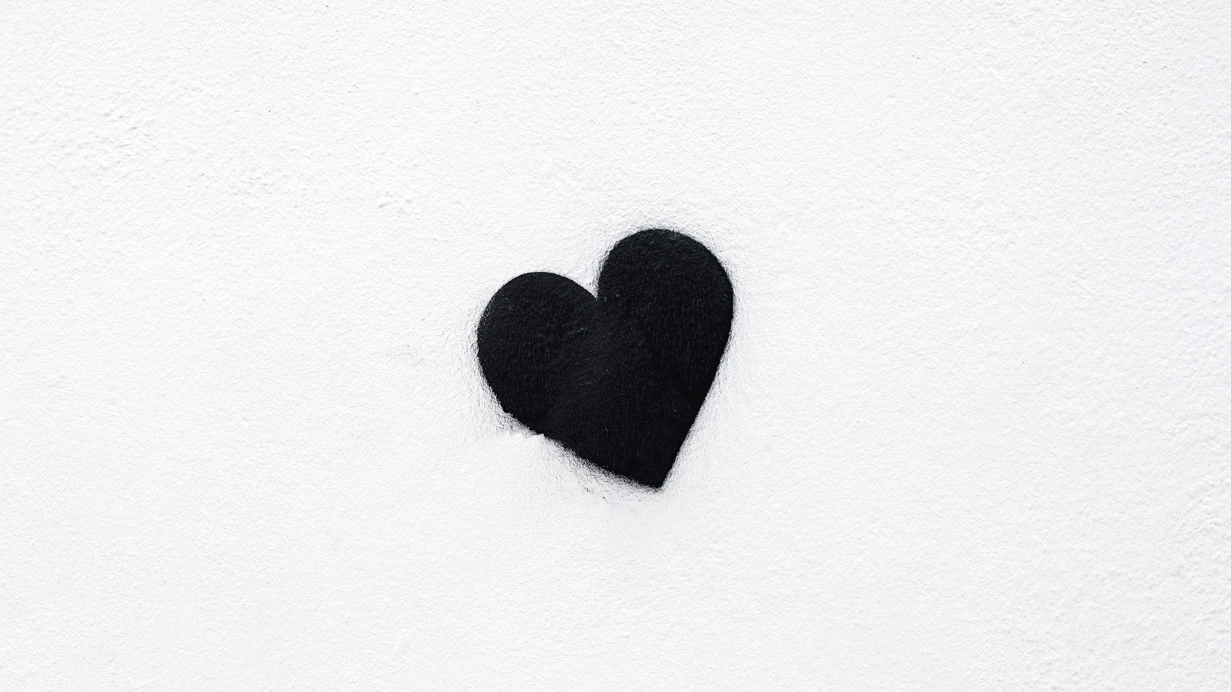 black shaped heart on white background