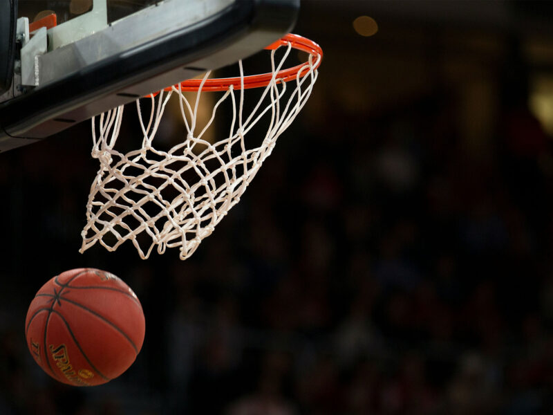 basketball swishes through hoop