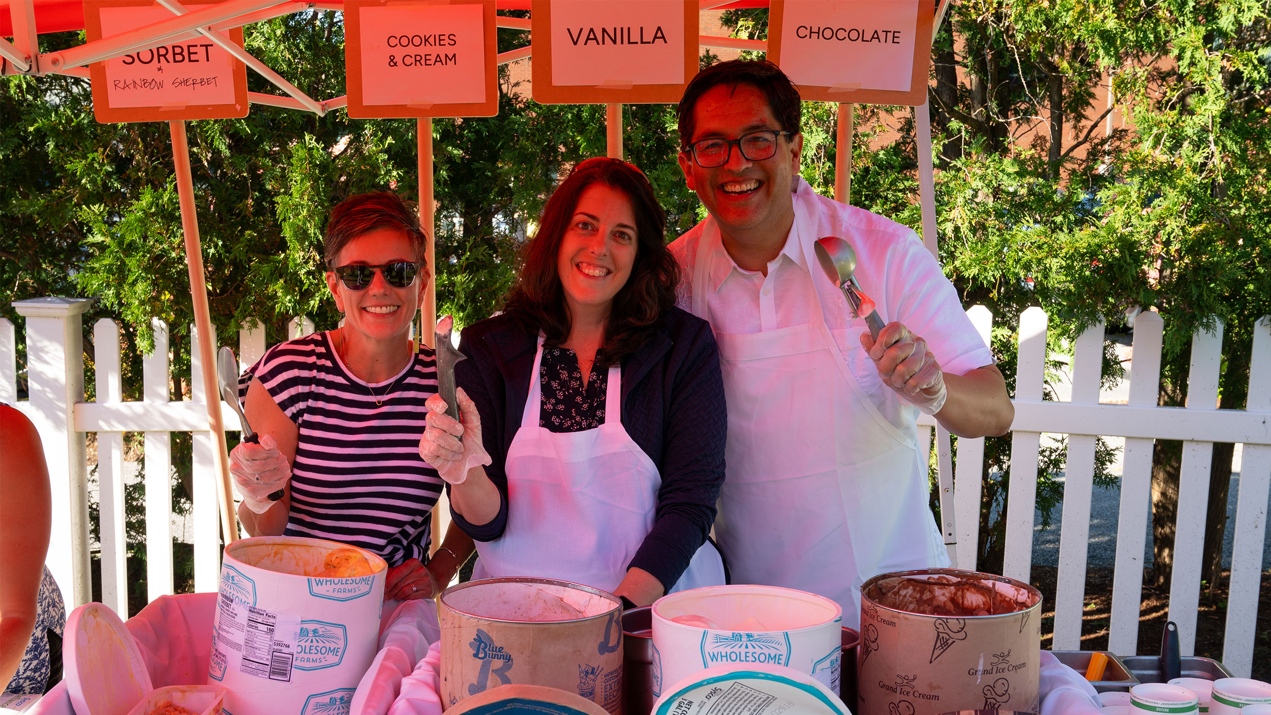 president hernandez and two staff members posing with ice cream scoops