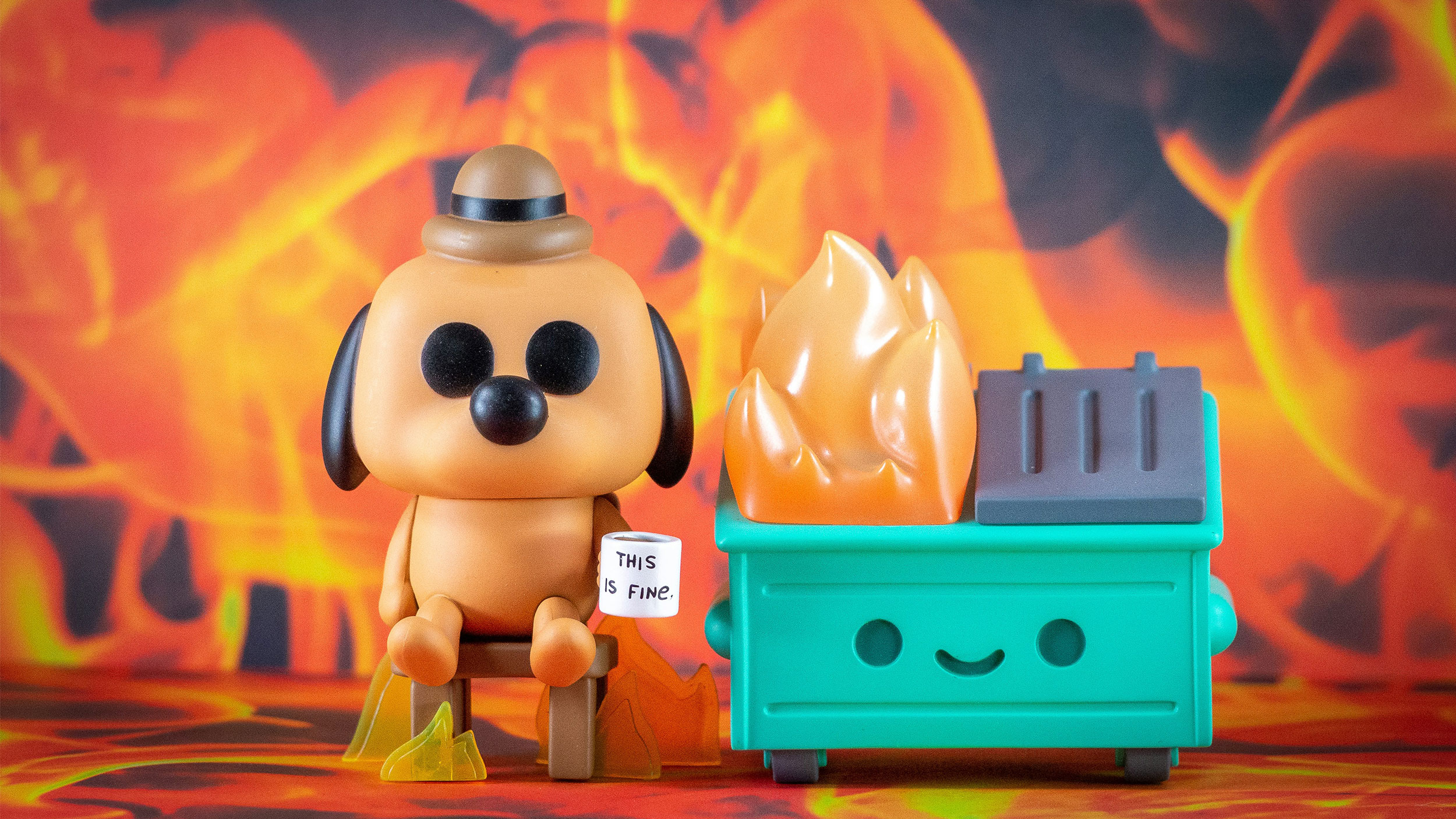 animation meme of a dog next to a dumpster fire with a mug that says "this is fine"
