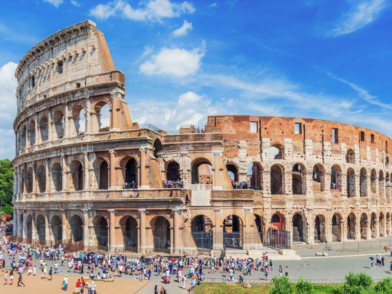 Colosseum in Rome, Italy on a sunny day, tourists