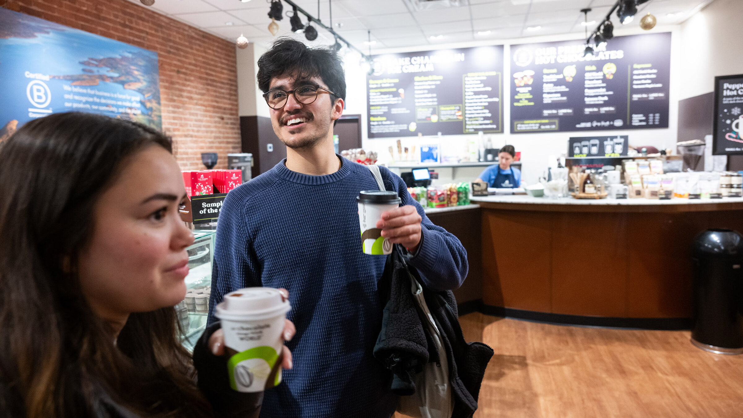 two students order coffee at a shop on Church Street