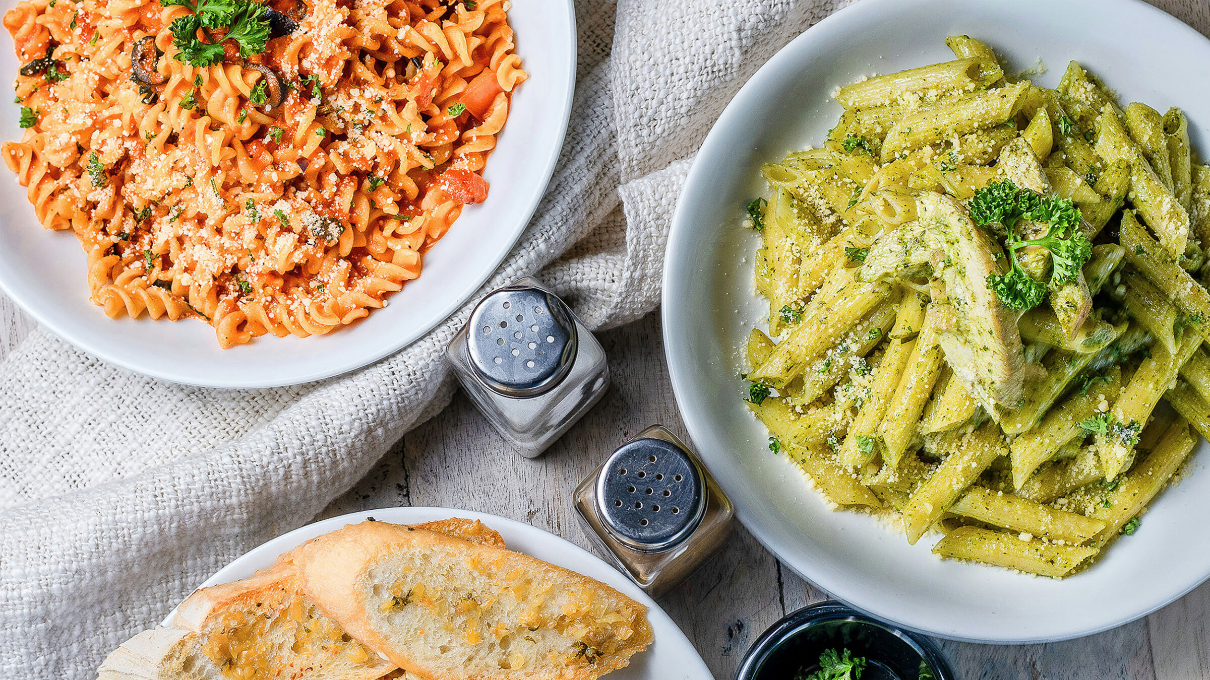 three bowls of pasta
