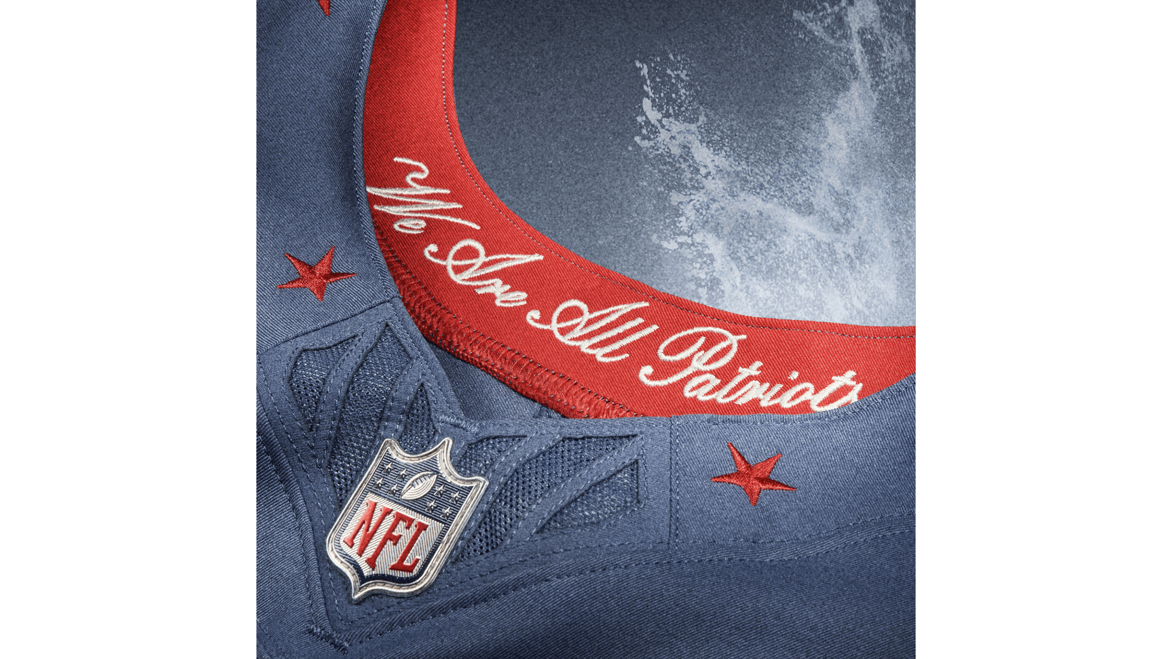 Collar of New England Patriots jersey designed by Champlain alum Liam O'Neil that says "We are all patriots"