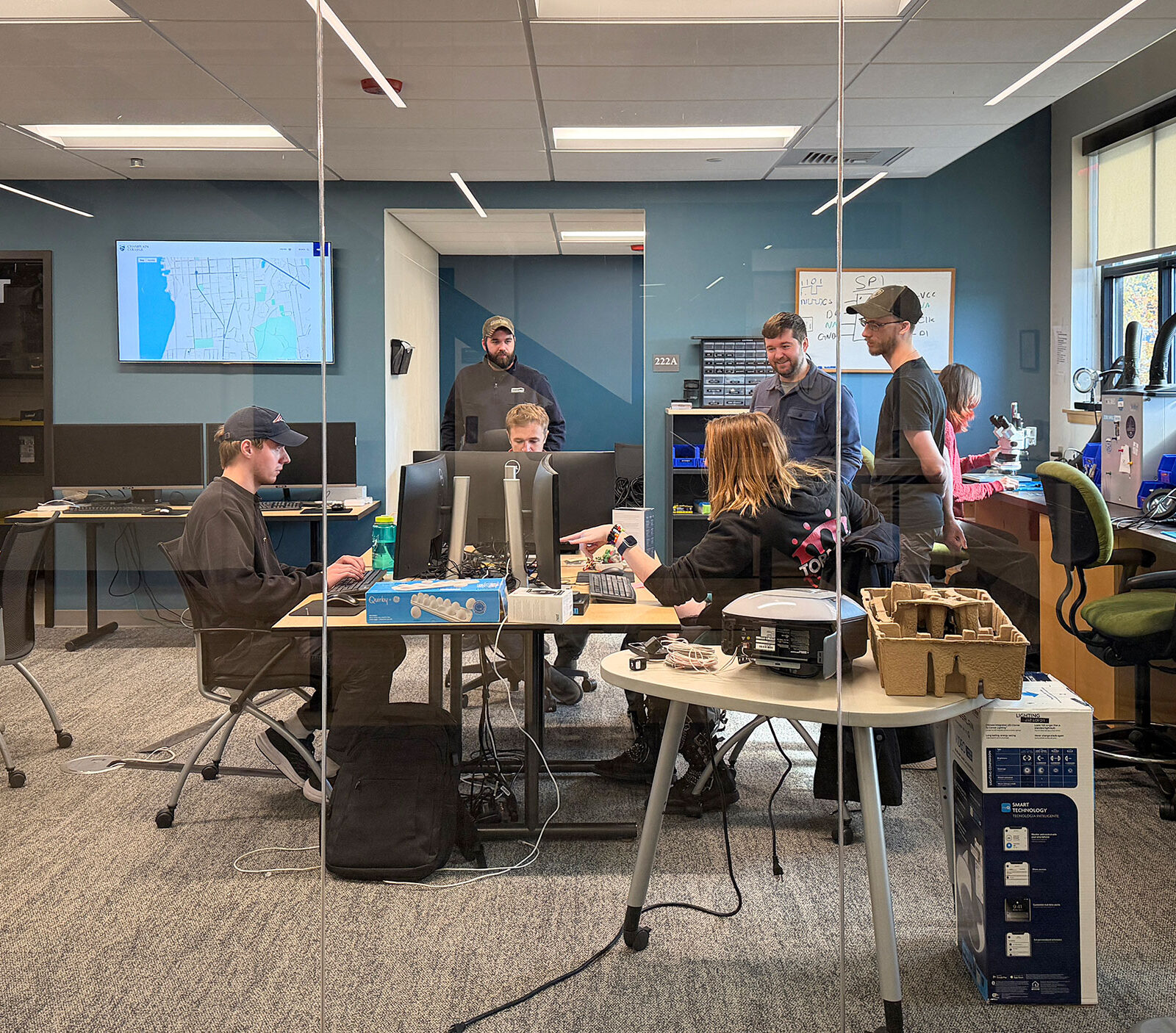 Interns collaborate at the Internet of Things Lab at the Leahy Center at Champlain College.
