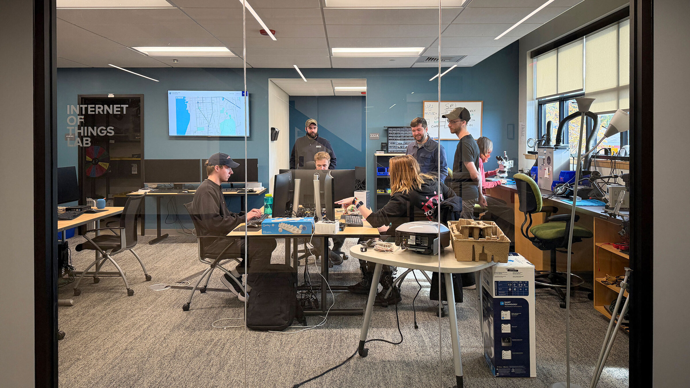Interns collaborate at the Internet of Things Lab at the Leahy Center at Champlain College.