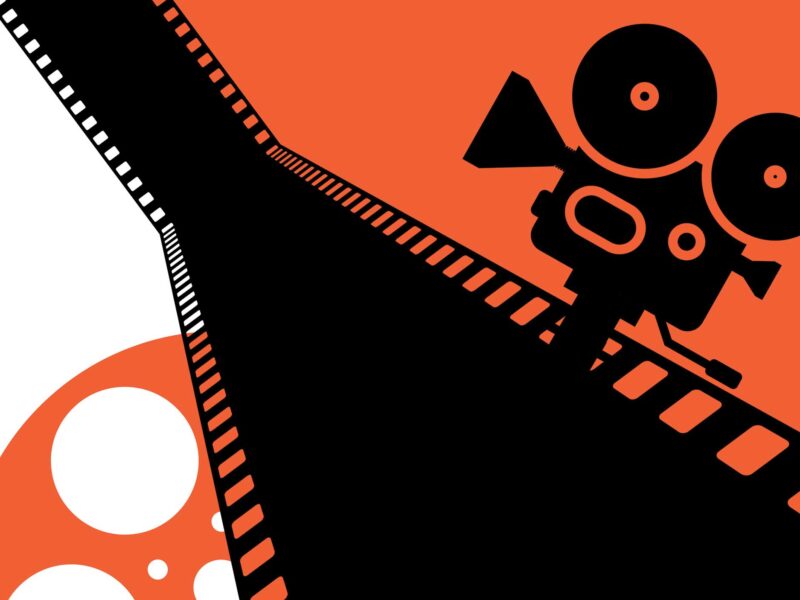 orange and black graphic of film strip, film camera, and film reel
