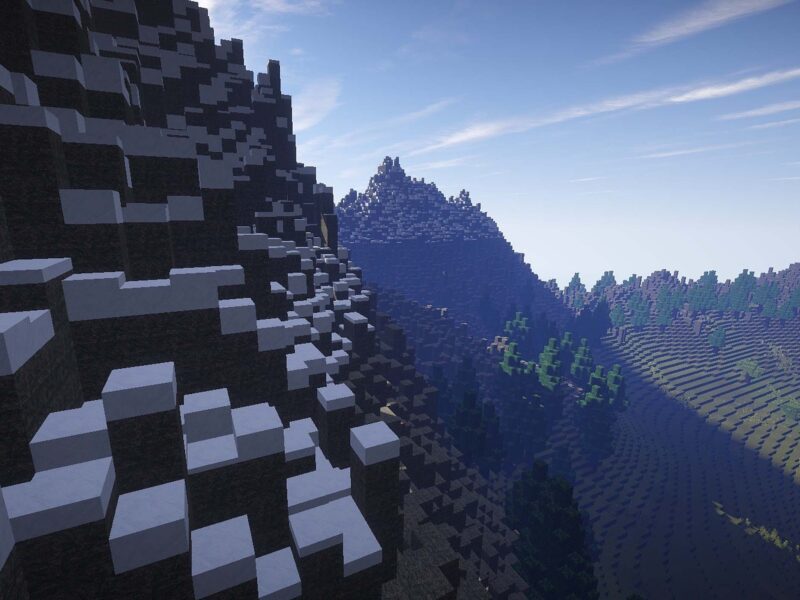 Minecraft overworld during the day, showing a mountain biome with snow