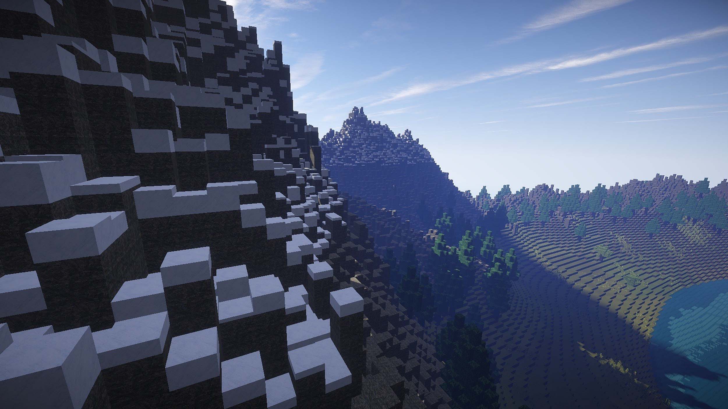 Minecraft overworld during the day, showing a mountain biome with snow
