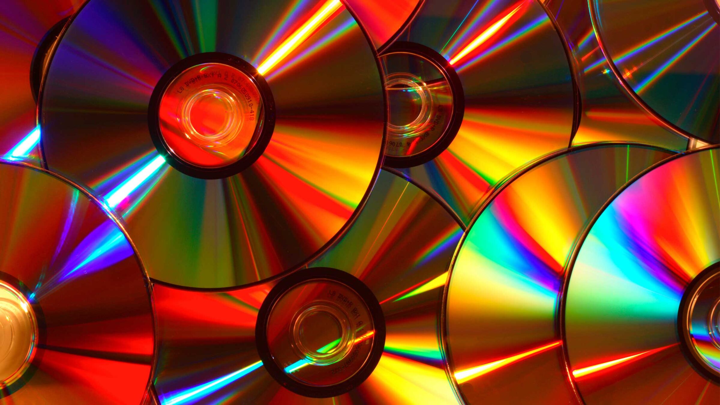 CDs reflecting colorful light
