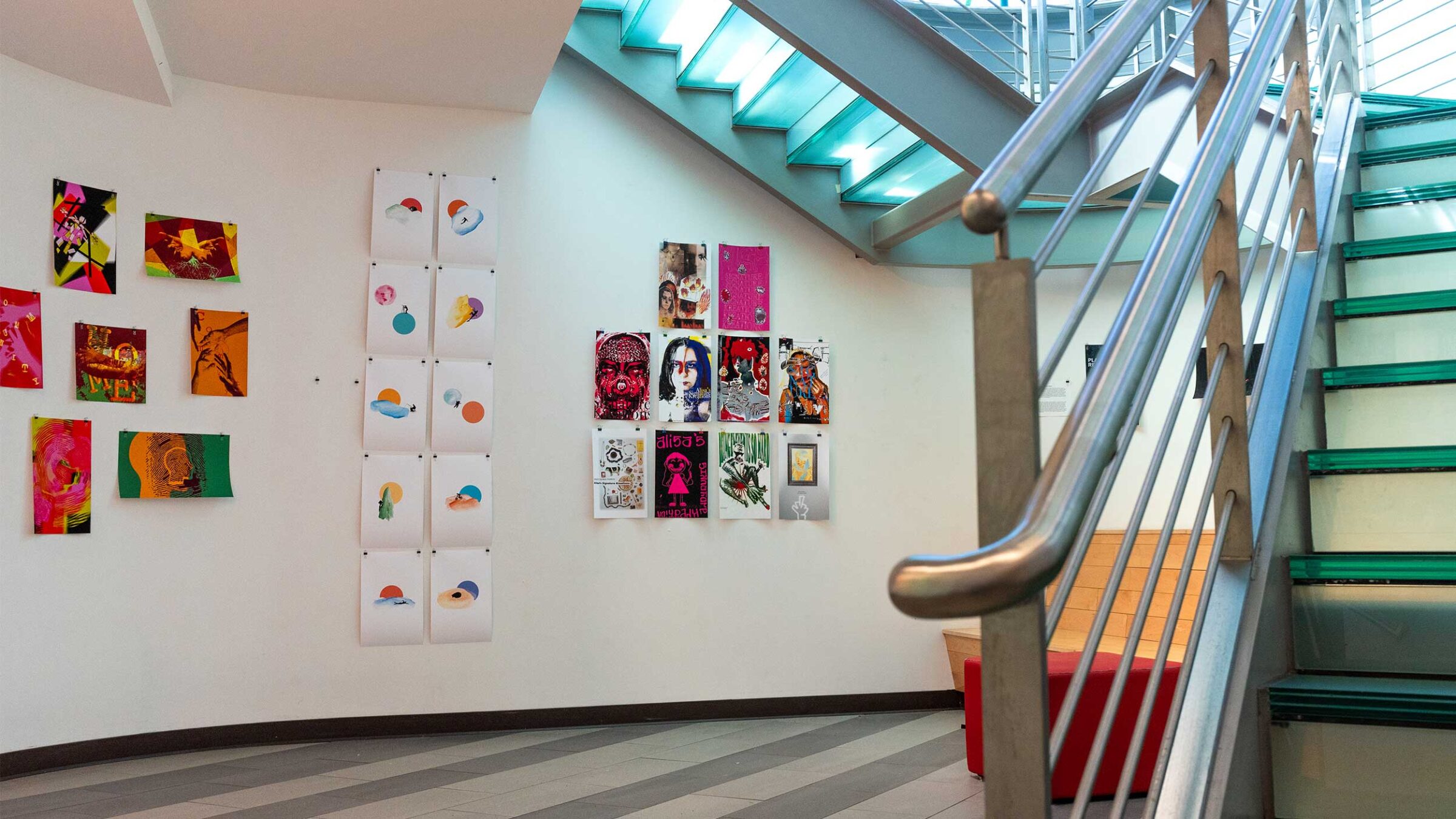 student-designed posters hanging in the stairnook gallery