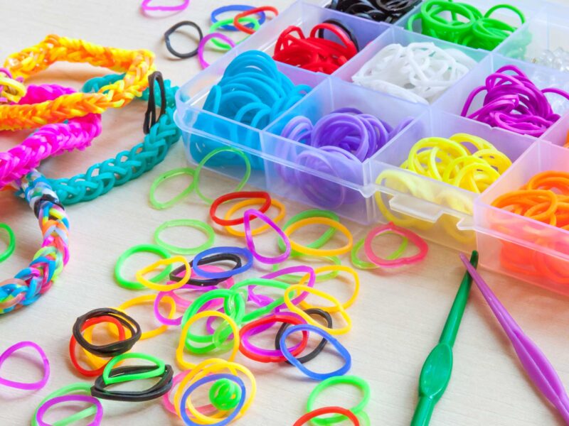 colorful rubber band bracelets and supplies
