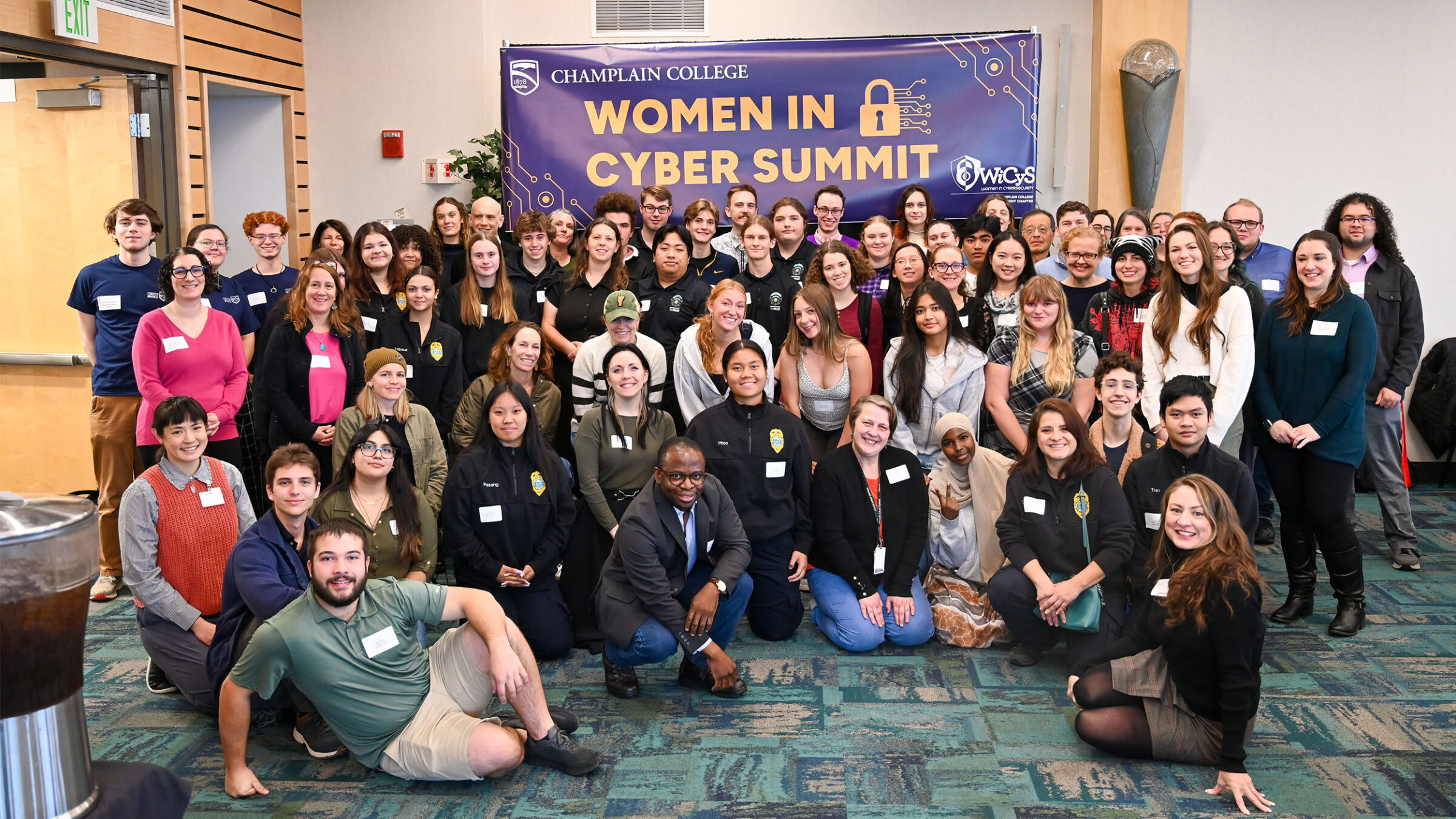 big group photo of attendees of the 2025 women in cyber summit at champlain college