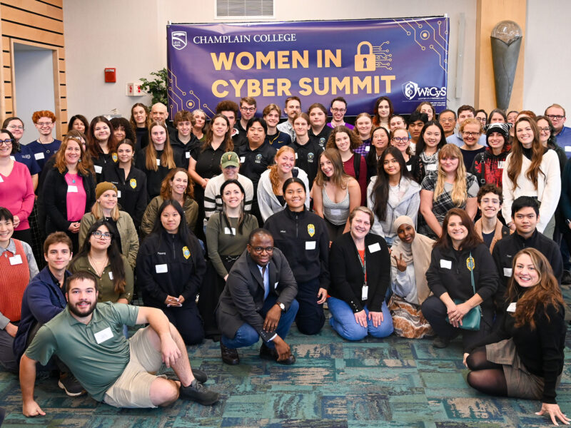 big group photo of attendees of the 2025 women in cyber summit at champlain college