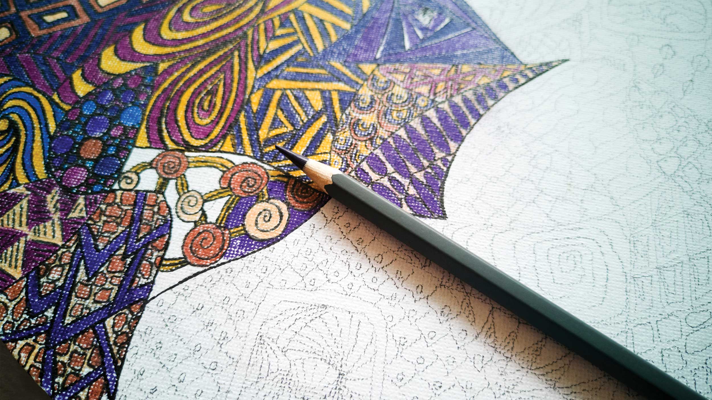 partially finished zentangle drawing with a colored pencil