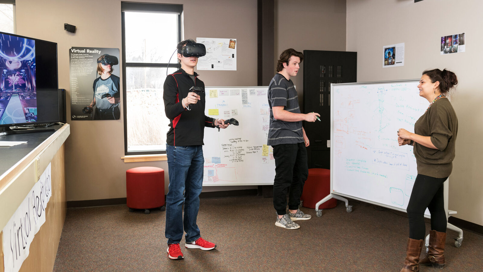 Students test a demo of a VR project.