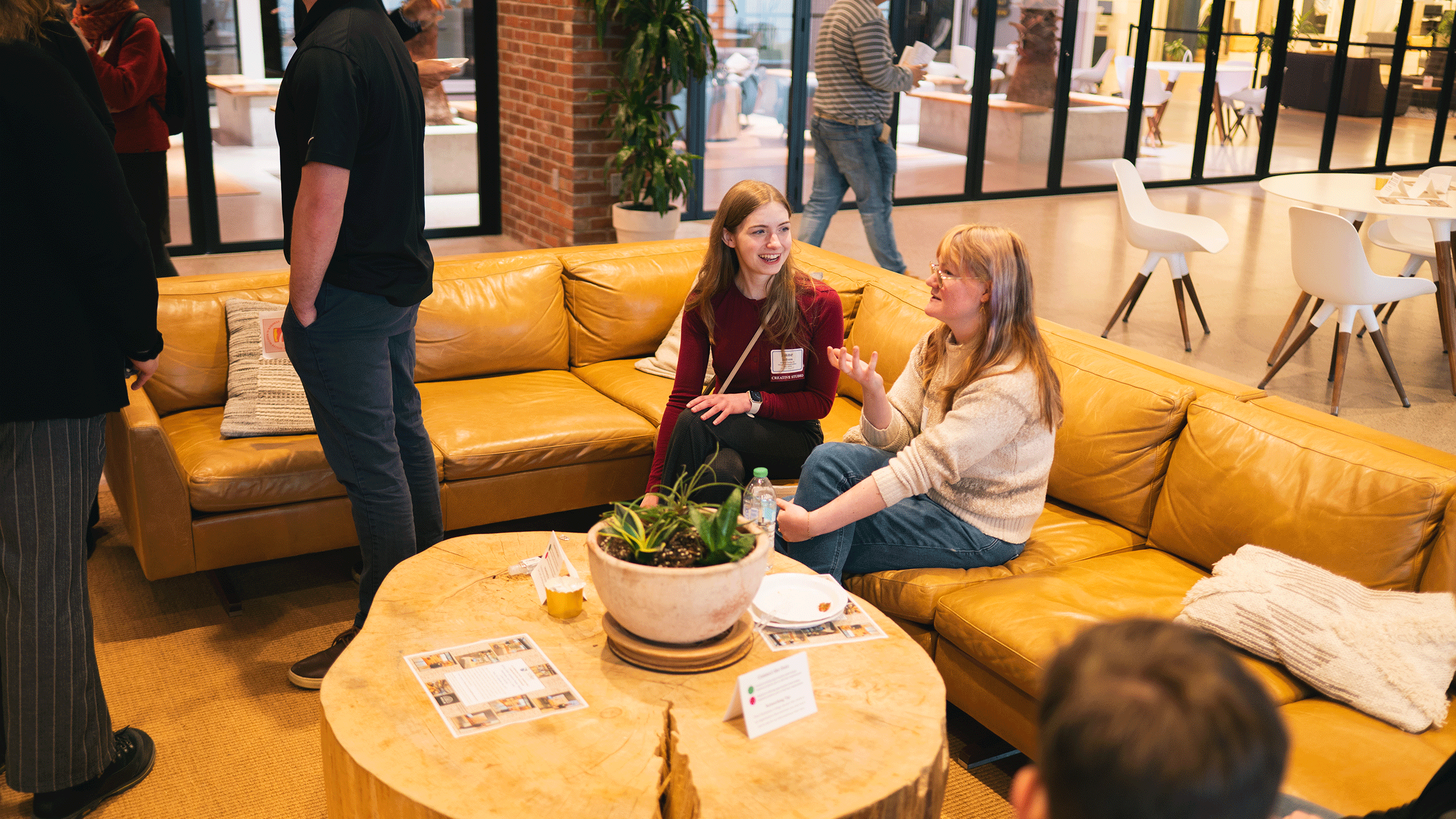 A student networks with an employer at Stiller Women in Business networking event