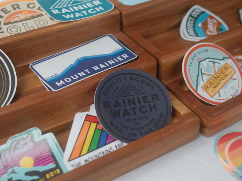 A pile of stickers on a display