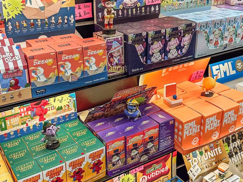 Colorful blind boxes in a store shelf
