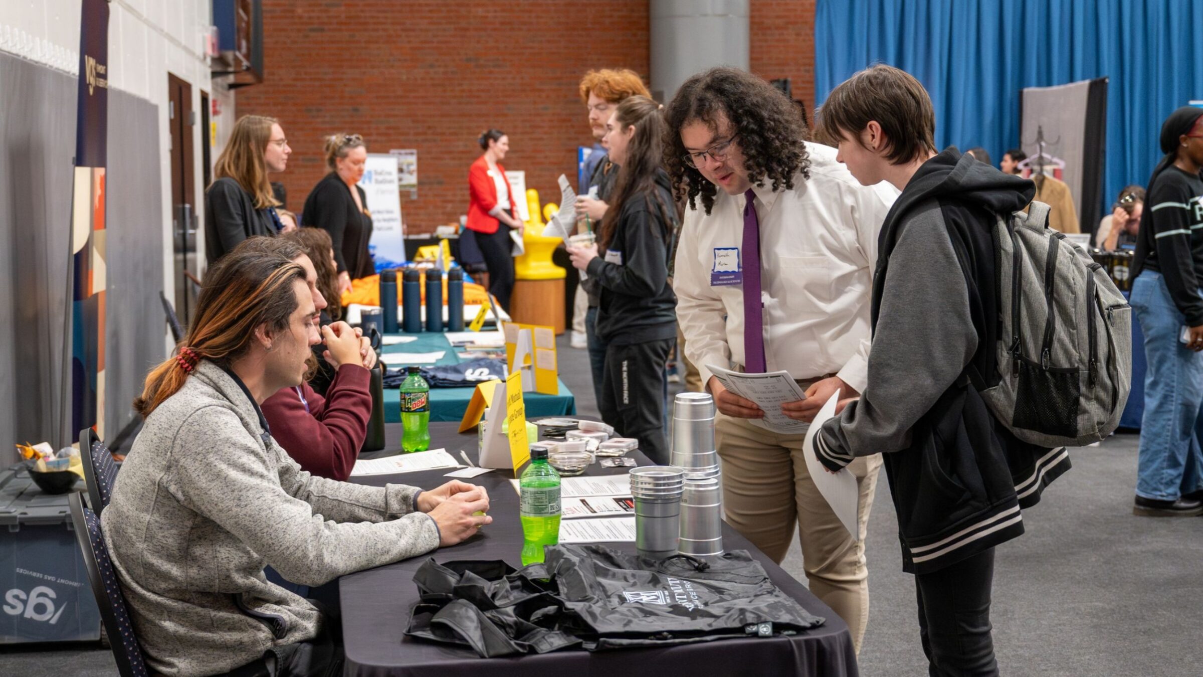 Students at a booth at the 2026 Fall Career Fair