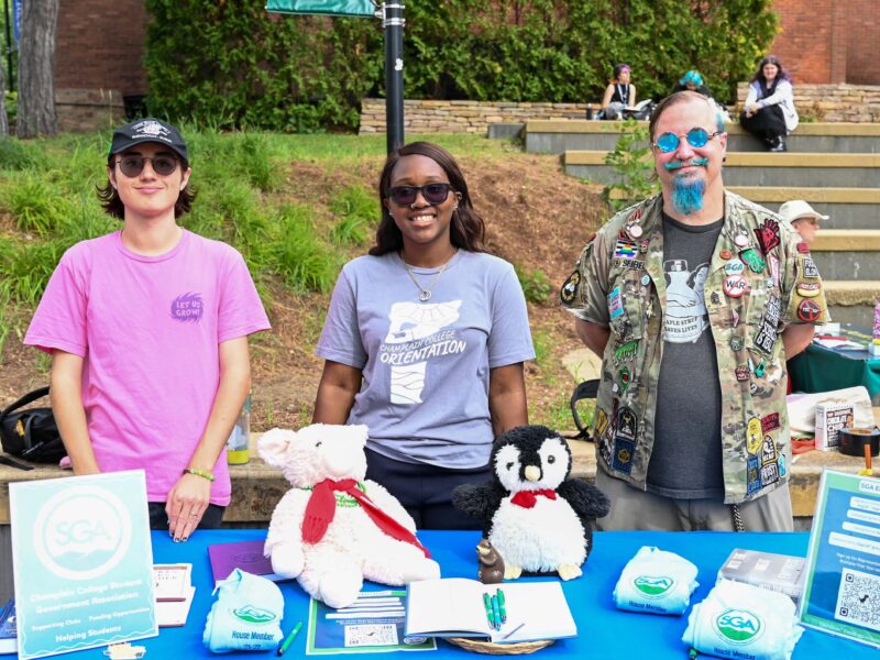 Students at the 2026 Fall activity fair around a table for the Student Government Association