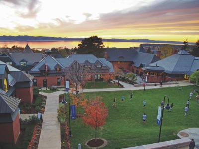 View of Champlain College campus and Lake Champlain at sunset from the third floor of the Miller Information Commons, the Champlain College library in Burlington, Vermont