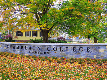 View of Skiff Hall at Champlain College in Burlington, Vermont with Champlain College sign in front